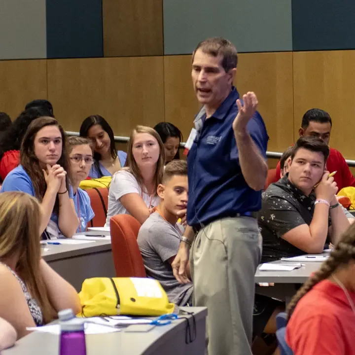 Professor teaching in a classroom.