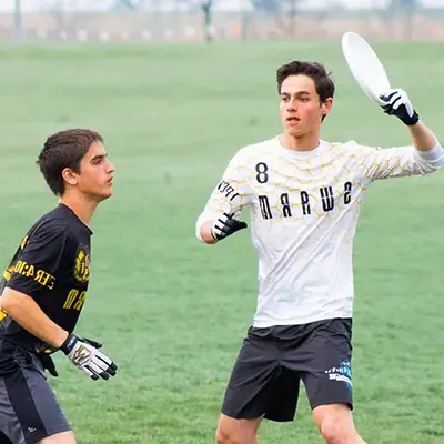 Two guys playing ultimate frisbee